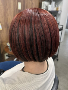 スタッフ「Tom」の担当ヘアスタイル「レッドアンブレラカラー」